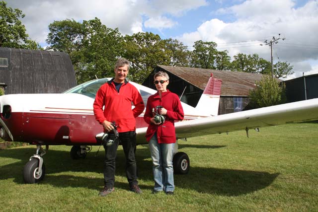 Picture of Martine and Mark outside the Piper Cherokee.